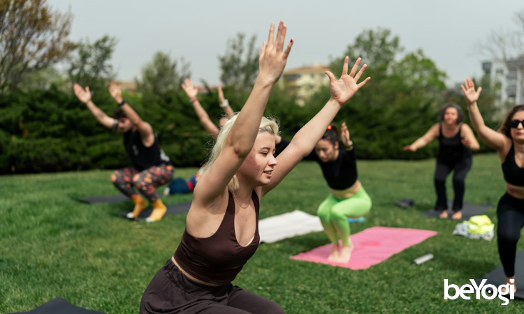 yoga-retreat-yoga-teacher A yoga teacher leads her students through asana at one of her yoga retreats.
